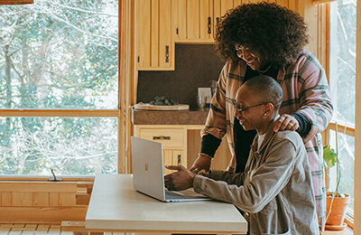 First time homebuyers finding out they won the bidding war for their new home