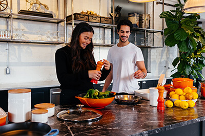 Couple cooking in their kitchen